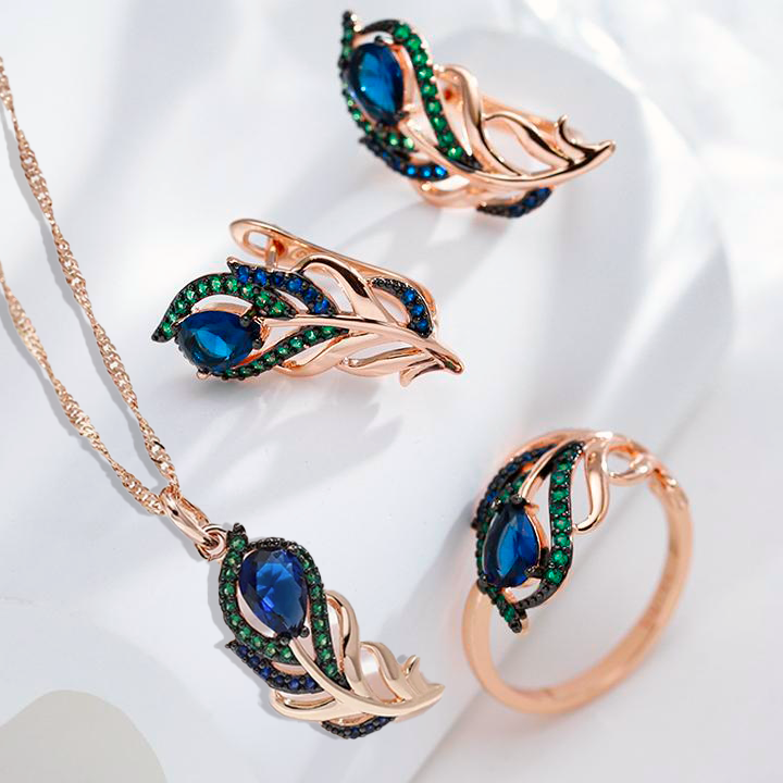Elegantes Pfau-Set aus 18K Rosé-Vergoldung