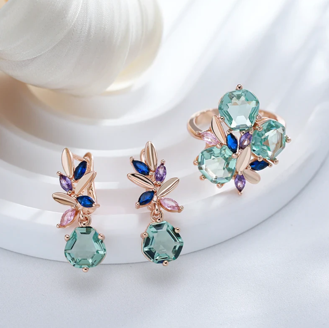 Elegantes Aquamarinblumen-Set mit luxuriöser 18 Karat Roségoldplattierung